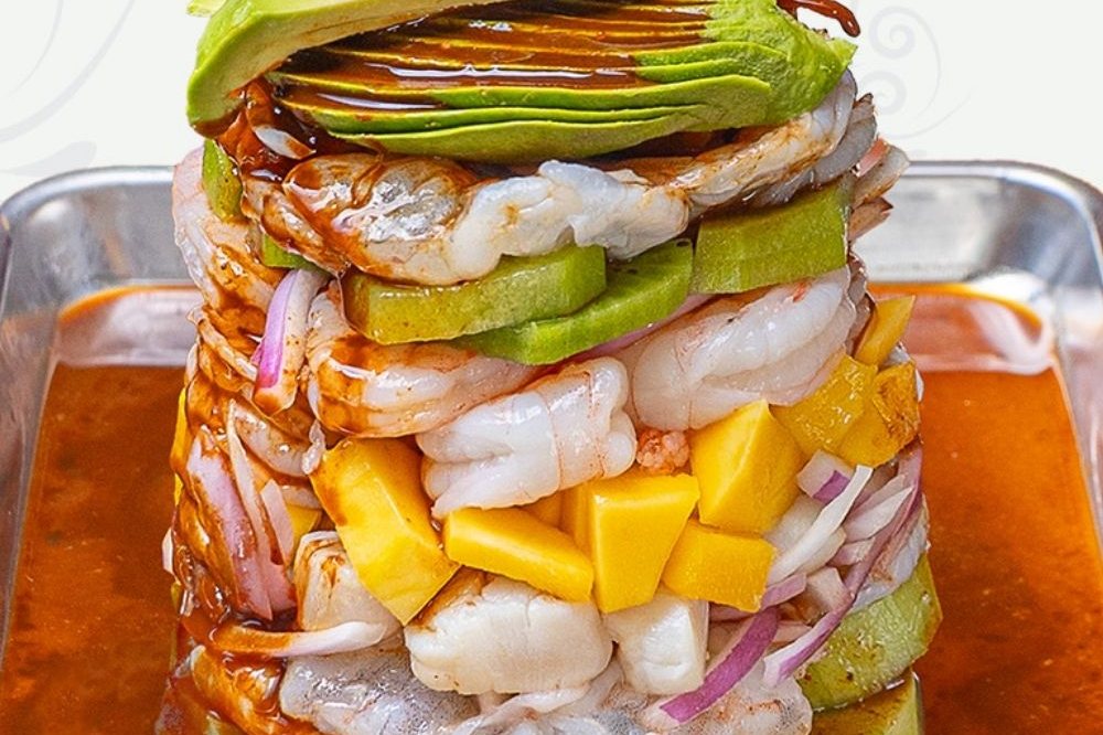 A seafood tower with shrimp, avocado and mango at Las Mamalonas in Little Rock